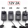 12V 24WパワーコンバーターアダプターEU US UK AUプラグAC 100-240VからDC 12V 2A電源アダプター供給トランス充電器CCTV LED用
