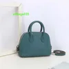 Bolide Leather Handbag Trusted Luxury Womens Bags 2024 New 18cm Shell Wrap Head Layer Cowhide Litchi Pattern Mini Bowling Ball Handheld Genui have logo HBT8KA