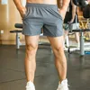 Männer Sportshorts schnell trocken kurz laufende Fitness Shorts Basketball Training Mini Pant Male Sportpant Summer Fitnesskleidung Orange 240401