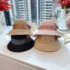 Sunshade Designer Bucket Hat Metal Letter Fashion Straw Hat Elegant Silk and Hemp Ribbon Decoration Beach Hats