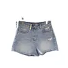 Blue Denim Shorts för kvinnors sommar 2024 Ny lös och bantande mångsidig design med en lapptäcke A-linje breda ben heta byxor