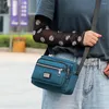 أكياس الكتف مصمم متعدد الوظائف السيدات Crossbody 2024 حقيبة سفر ملونة صلبة هاتف نايلون عالي الجودة نساء