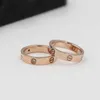 Van Bracelet Cart Giappone e Corea del Sud in titanio Steel Womens Rose Gold Coppia di indice Anello di dito maschio Studente Student Lettering di moda versatile