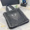 2024 Ny vävd väskesdesigner Totebag 10a Weave Straw Clutch Bag Summer Beach Bag liten virkning Tote väska handväska Tygväska lyxkvinna axelväska crossbody för kvinnväska