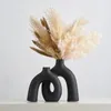 Vases en série Vase Résumé Art Decoration Home Decoration Cerramic Artisanat Bottes décoratives Modern Design Living Room Ornements de bureau Accessoires