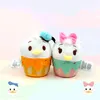 かわいい3人の目の人形クロスドレスパイナップルKuromi Jade Gui Plush Toy Doll Keychain Grab Doll Machineペンダント