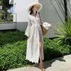 Robes décontractées de vacances blanches françaises creux robe brodée pour les femmes élégant fusée à manches longues en V Viette à col fendu printemps 2024 tendance