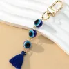 Glückliche türkische böse Eye Keychain Harz Perlen Quaste Tassel Charme Key Ring Auto Handtasche Accessoires Schmuck für Frauen Mädchen