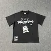 T-shirt de camiseta masculina da moda Broken Planet Cartoon Skull Foam Print Vintage Y2K Camisetas homens e mulheres casuais de manga curta solta