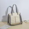 Umhängetaschen 2024 Canvas Bag Damen Single Messenger Japanisch große Kapazität Hit Color Wild Handtasche Frauen