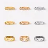 Bands Sonneurs Love Women Men Ring Designer Bijoux de mode Titanium en acier Single Grille avec diamants couple décontracté Gold Gold Sier Rose OT3SW