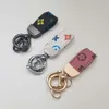 2024 French Mini Cute Chain Pendant Tiktok Bubble Matt Small Fresh Old Flower Leather Key Ring