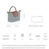 2024 Fashion Luxury Tote Designer Brand Sac à bandoulière décontracté Femmes Crossbodybag Handbag Le cuir de haute qualité Sac Sac à main polyvalent 10A 12A