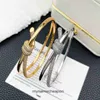 Designer de haut niveau pour le bracelet à nœuds en diamant à double couches Tifancy pour femmes en cuivre luxueux de haute qualité Bracelet en or 18 carats d'or 1 à1