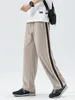 Pantalon masculin 2024 Paptilement de sueur de printemps Corée de mode coréen Trache de taille de la taille de la taille de sport