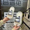 Two color slippers for women in summer with thick soles and a feeling of stepping on feces. Fashionable metal color bear home, indoor bathroom slippers for home use
