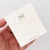 50st Bow Hair Clip Card smycken Förpackning Bag Kort papperskort för halsband armband tappar örhänge förpackning kartong