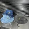 Trimphal Designer Womens Bucket Hats Luxury Denim Bucket Hat Fashion Bucket Hats Summer Spring Sunhats Beach Holiday Le Chapeau