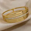 Bangle Dodohao 316L из нержавеющей стали Многослойные бараслеты с широким цирконом браслеты для женщин Коренерия золотого цвета водонепроницаемые украшения