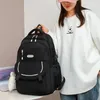 Sacs d'école 2024 Girl étudiant Sac jeunesse nylon Matériau coloré colorée