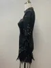 Abiti casual Donne Donne inverno sexy cristallo strass piuma abito nero a maniche lunghe 2024 Elegante festa serale per esibizioni