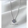 Collier de créateur de haute qualité Vancleff pour les femmes 925 Collier de trèfle de trèfle à quatre feuilles en argent sterling Purple Silver Purple avec un pendentif d'herbe chanceuse en or blanc 18 carats