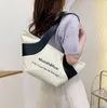 Wholesale ladies shoulder bag 3 colors literary fan color matching leather handbag daily Joker thick canvas backpack simple Joker underarm bag 2234#