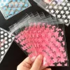 50pcs Pink Star Sac Authesive Opp Sac Transparent Carte Film Sleeve de protection pour Photocard Holder Jewelry Gift Packaging Sacs