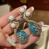 Boucles d'oreilles en peluche de luxe médiévale émeraude géométrique grande en dentelle de chute d'eau verte perle