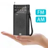 Radio Mini Pocket FM / AM Radio Portable Radio numérique pour les personnes âgées Sports Outdoor Player avec une prise d'écoute 3,5 mm
