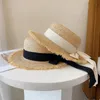 Korea Natural Raffia Wide Birm Sun Hat Daily Casual Falt Straw Black White Bow Weave UV Blocking Beach Vacation Panama240409