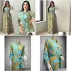 Vêtements ethniques Fashion Français Élégants robes maxi pour les femmes Retro Print musulman Dubai Abaya Lapon à poitrine unique à manches longues Dh9nh