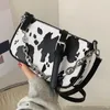 Bola Vacas de luxo Padrão de cobra ombro 2024 Mulheres Personalidade Moda subaxtada PU PU bolsa de couro e bolsa