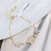 Designer vans clover bracelet Fashionable New Delicate Diamonds Cat's Eye Clover Bracelet Elegant and High-end 18K Ladies' Bracelet