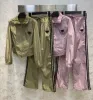 Fashion Design en deux pièces sets de veste de survêtement pour femmes 2024 Cantrage à rayures costumes de revers femelle Sweat Sports Sports Sports