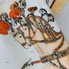 女性ドレスデザイナースカートレディースドレスファッションブランドドレスロゴロングスカート馬のプリントわずかにウエストA字型の丸い首半袖スプリングドレス4月8日