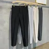 Мужские брюки 2024 Весна летние повседневные брюки Slim Fit Work Work Elastic Trasting Blosers Blosers Мужчина -черный серый плюс 40 42