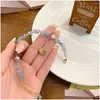 Charm Bracelets Kokomi Shell Blue Gem Stone Chain Crystal Bracelet Cosplay Genshin Impact Girls Fanshion Costume Props Gift Drop Deliv Dh8Om