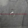 T-shirty męskie w stylu Vintage Unane uszkodzone Święty Michael T-shirt mężczyzn Kobiet Tee Splash Ink Graffiti Pocket Thirt J240409