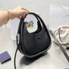 مثلث المتسوق الحقيقي حقيبة سلة جلدية حقيقية Weekender Womens Travel Mens Designer Tote Bucket Bag Bags Handbags Magnetic Snap Closure Cross Body Clutch Bags