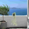 Dekorativa blommor konstgjorda hängande vinrankor: grönska krans eukalyptus murgröna lämnar växter i potten för bondgård