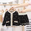 New Children's Sweater Set Girls Fashion Lettre de mode imprimer mignon jupe cardigan tricotée 2 pièces vêtements de bébé 1-7t automne et hiver