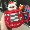 Canecas Copo de Natal Presente de mão criativa Gita de cerâmica caneca por atacado de alto valor água com colher de tampa