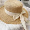 Korea Natural Raffia Wide Birm Sun Hat Daily Casual Falt Straw Black White Bow Weave UV Blocking Beach Vacation Panama240409