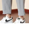 Pantalones para hombres primavera verano bolsas sólidas venda elástica elástica cintura alta deportes casuales pantalones pequeños pantalones de piernas preppy estilo