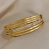 Bangle Dodohao 316L из нержавеющей стали Многослойные бараслеты с широким цирконом браслеты для женщин Коренерия золотого цвета водонепроницаемые украшения