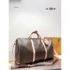 مصمم Duffle Classic 45cm 50cm سفر سفر للرجال جلدية حقيقية حقيبة يد كبيرة يحمل أكياس الكتف رجالًا سعة كبيرة سعة سفر حقيبة سفر