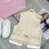 Женщины дизайнерские юбки Set Women Fashion Rideveless Одноборная жилета повседневная плиссированная короткая юбка с двумя частями