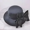 Basker brudtopp hatt kvinnlig brittisk hepburn stil mode retro bow mesh födelsedagsmiddag huvudbonader