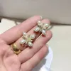 Boucles d'oreilles en alliage en alliage perlé poteaux d'oreille Pendants populaires Accessoires pour femmes cadeaux préférés dans les pays européens et américains